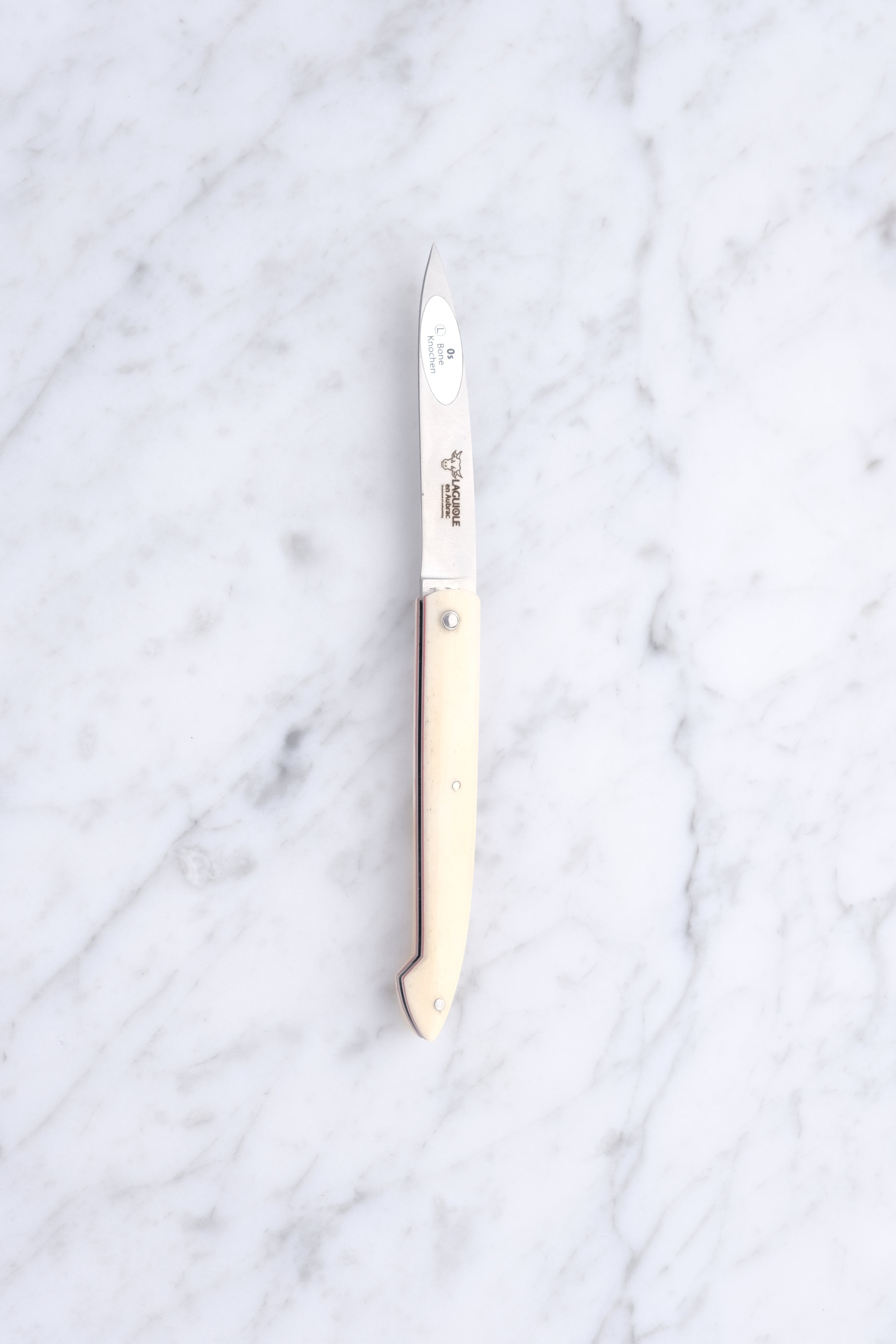 Laguiole Taschenmesser 10cm – Ochsenknochen mit rotem Liner
